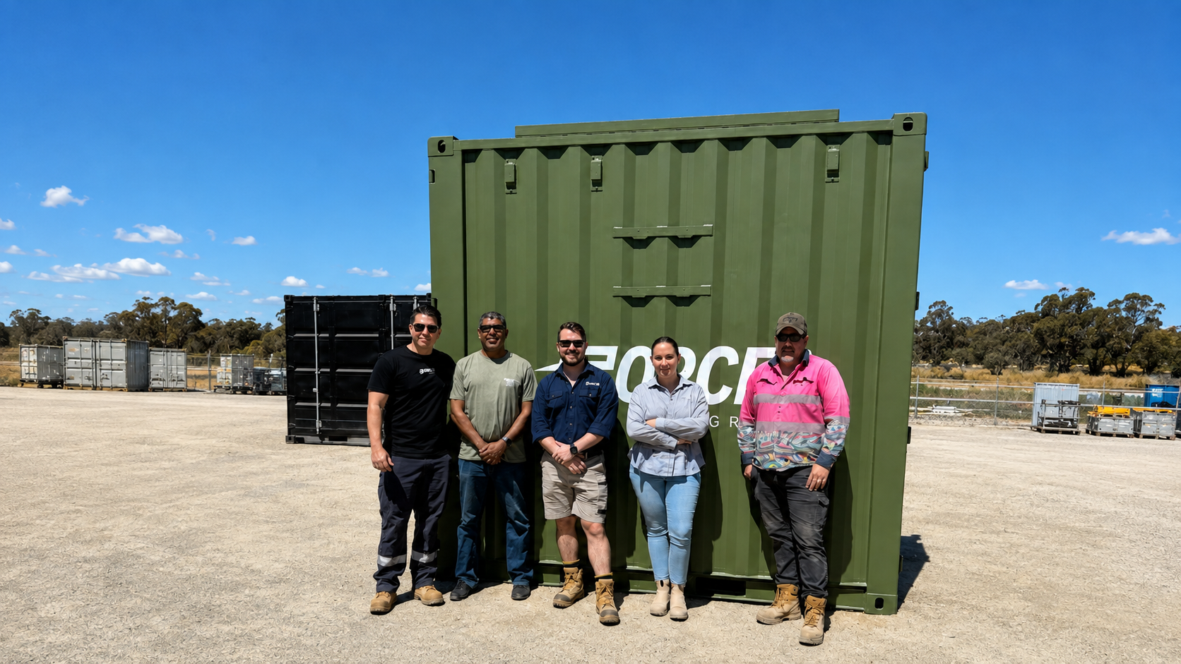 Forces Group project delivery team with the completed green deployable unit for the ADF / PNG Cooperation Program